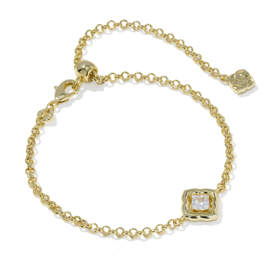 A delicate yellow gold chain bracelet with a square bezel-set clear gemstone charm and an adjustable lobster clasp, shown on a clean white background.