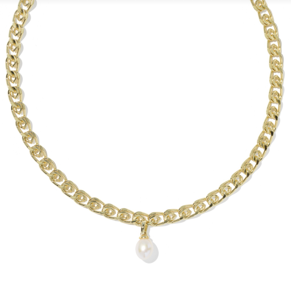 A gold chain necklace with a small white teardrop pearl pendant, displayed on a clean white background.